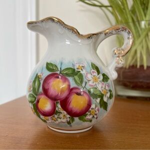 Charming creamer with apples